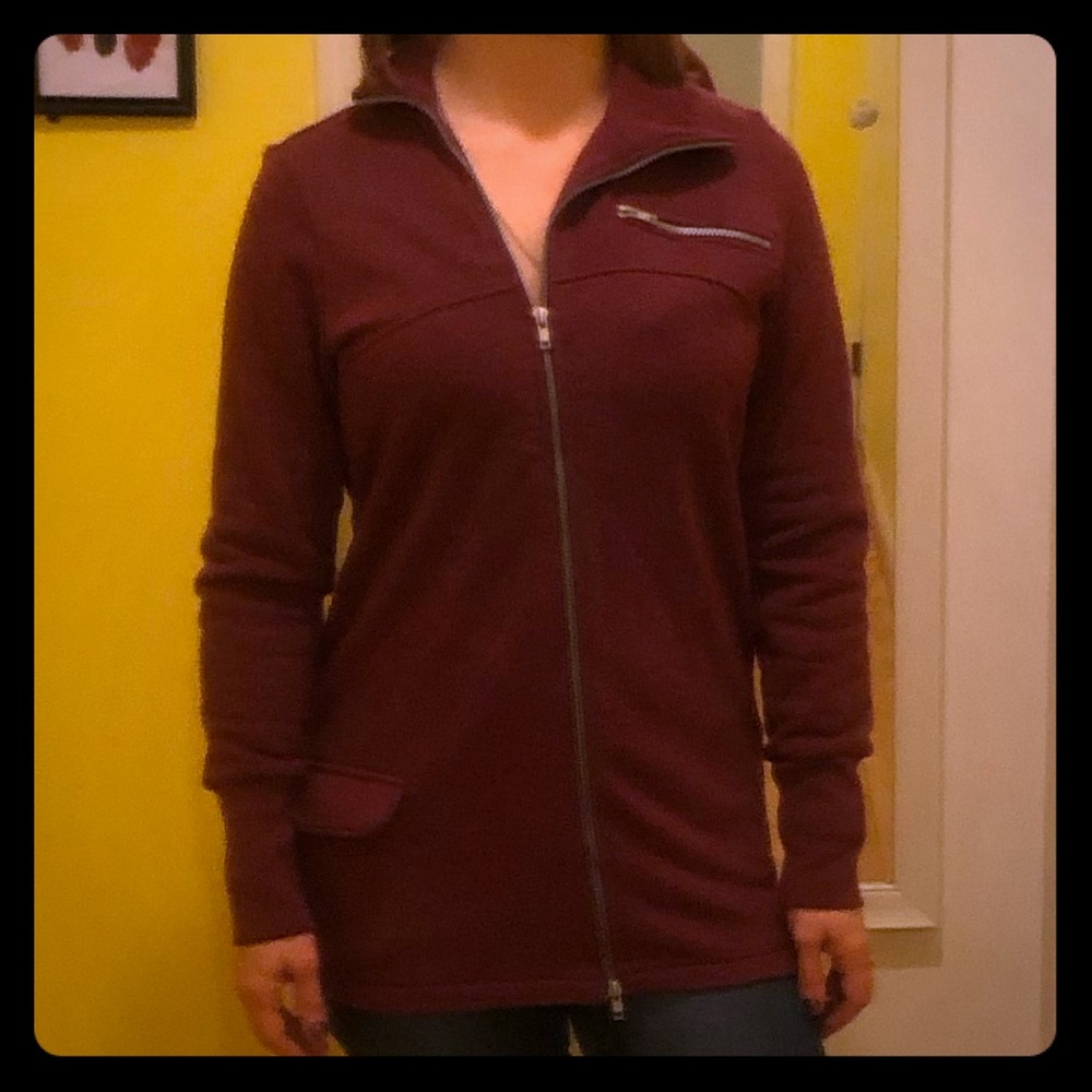 Long sleeve zippered shirt.